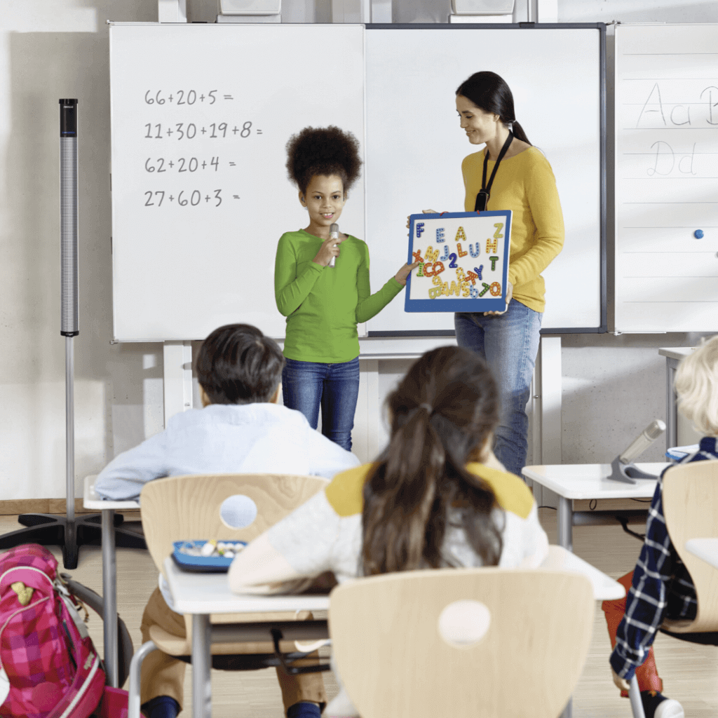girl presenting in classroom
