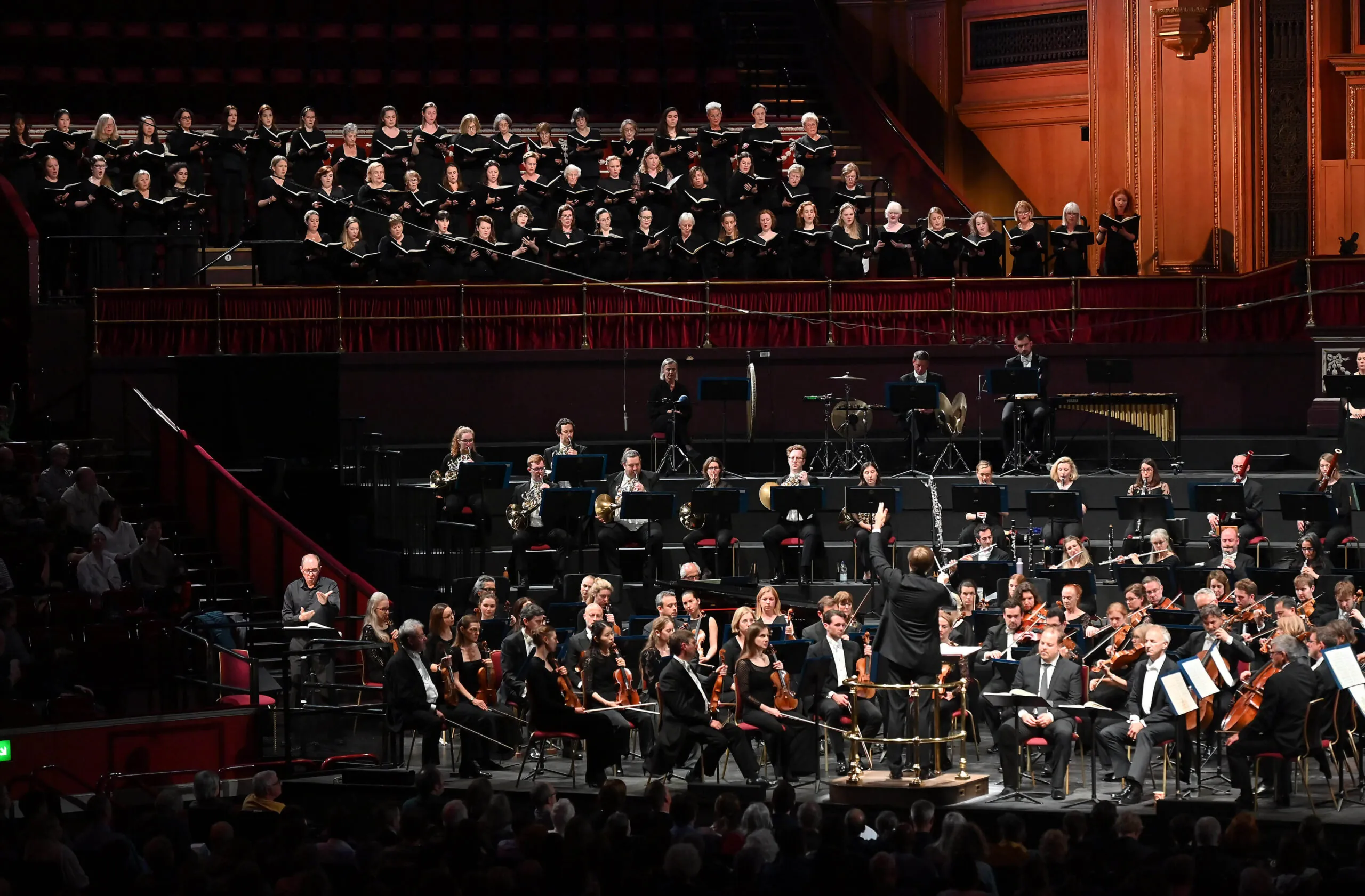 Vasily Petrenko conductor, the Royal Philharmonic Orchestra, the Philharmonia Chorus and Paul Whittaker, BSL Interpreter, RAH, 26 May 22 credit Mark Allan 2
