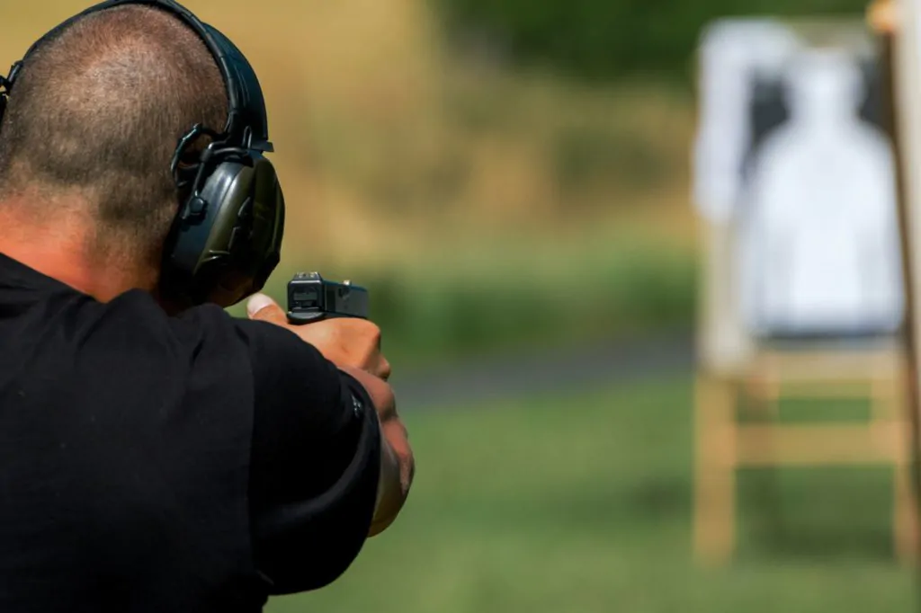 man shooting target